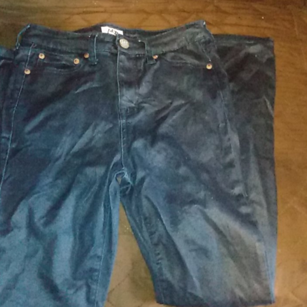 A pair of Tokyo Darling pants shiny material
